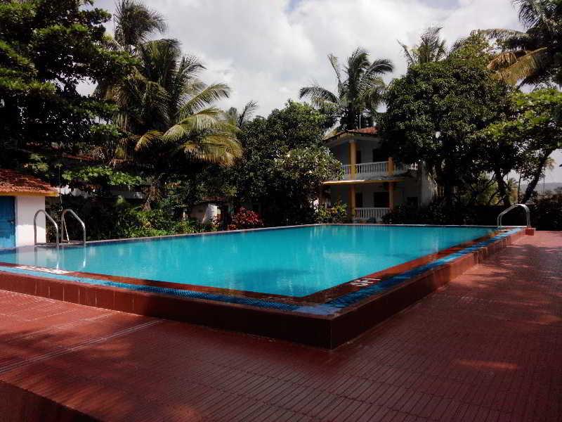 Hotel Riverside Baga Ngoại thất bức ảnh